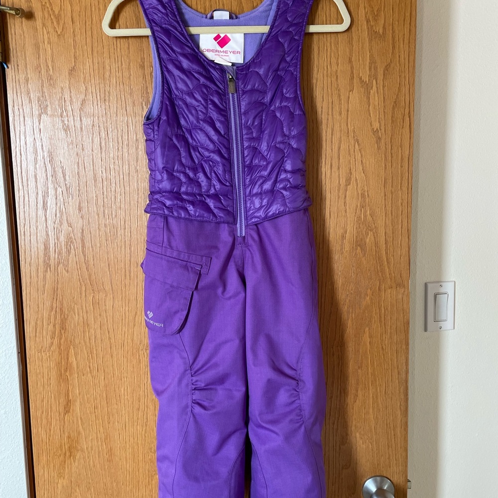 Girls Obermeyer Ski bibs, size 5, purple, worn 1 season excellent shape.